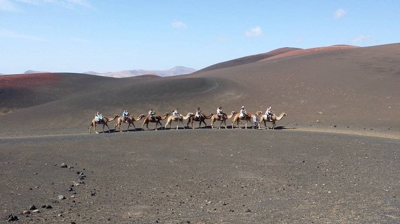 Riding a camel in Timanfaya